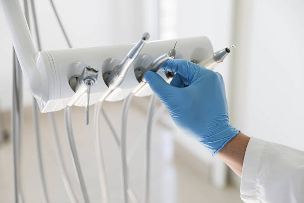Professional Tooth Extraction technician working in Shelbyville, IL